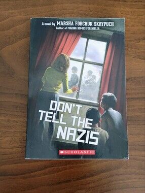 Scholastic Paperback with Black and Red Spine Design